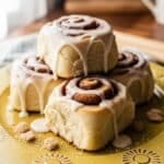 Homemade Cinnamon Rolls on golden yellow plate