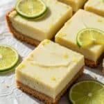Key Lime Pie Bars with whipped cream and lime zest