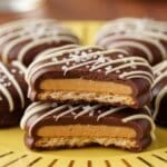 Extreme close-up of Ritz Cookies on a yellow plate showing chocolate texture and peanut butter filling