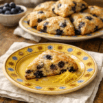 Homemade Blueberry Scones on yellow plate