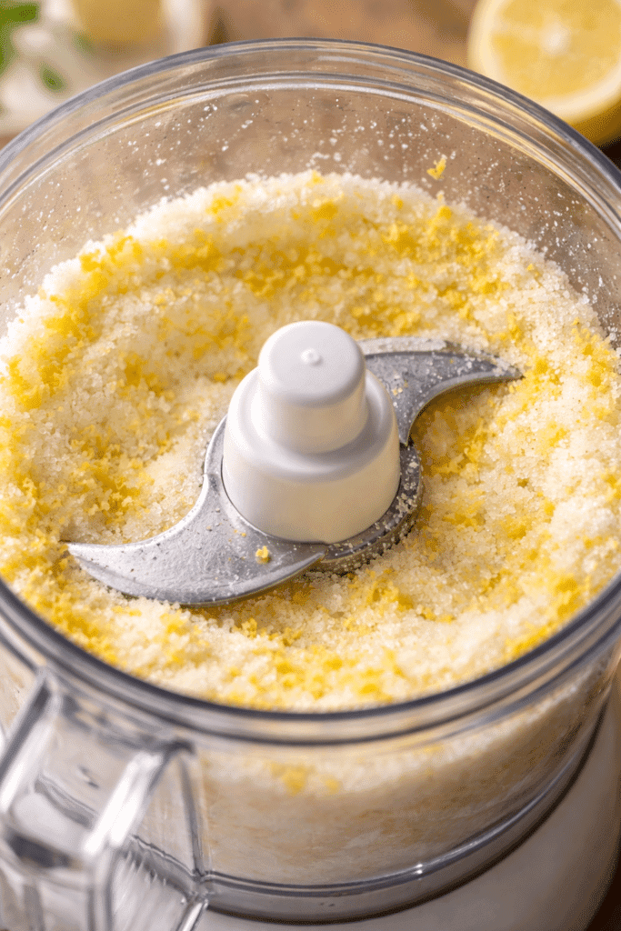 Pulsing lemon zest and sugar in food processor