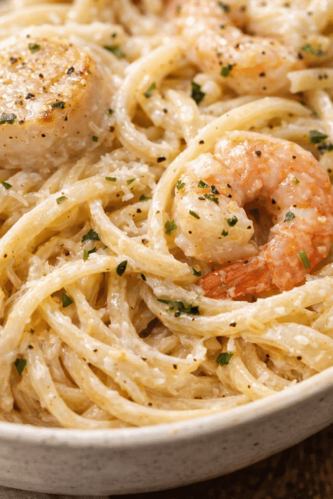 Creamy seafood pasta texture close up