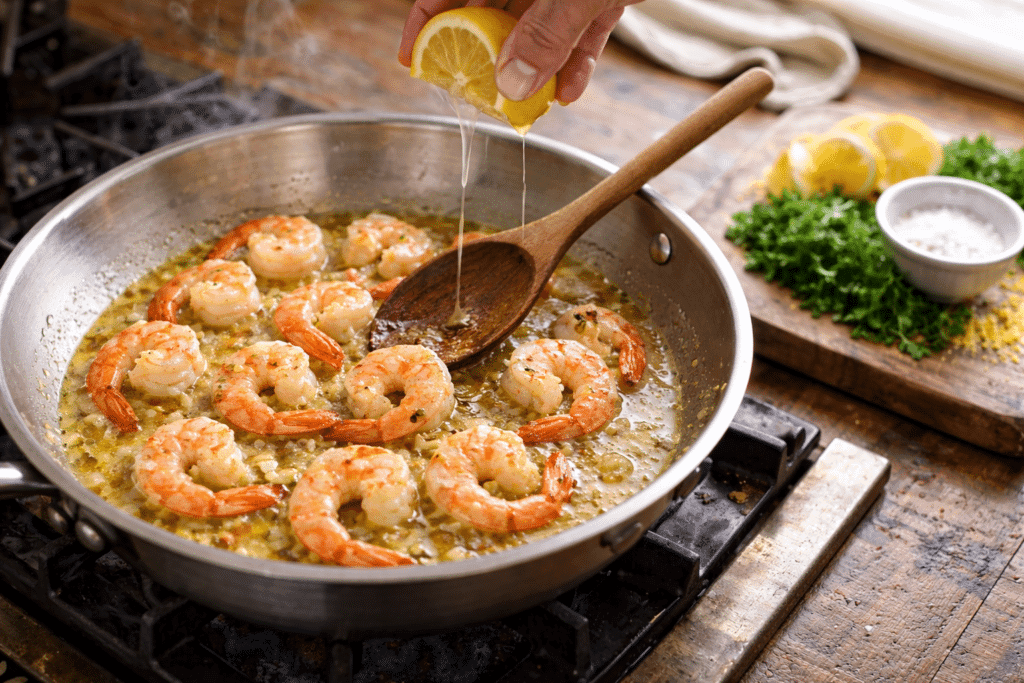 cooking shrimp and garlic for shrimp linguine