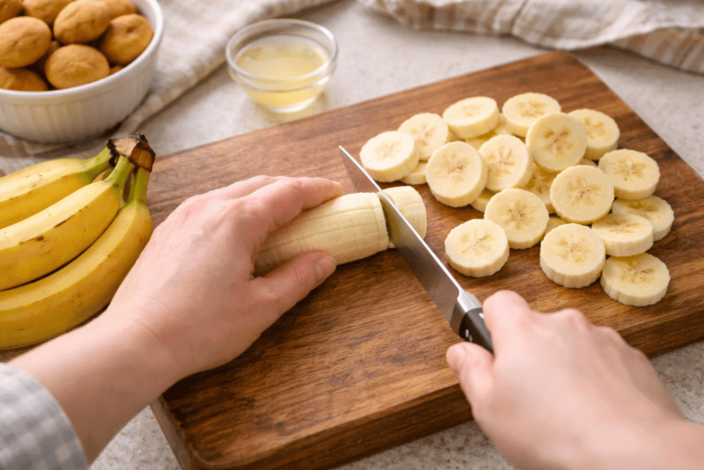 slicing bananas for banana pudding