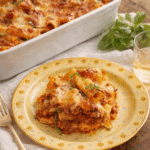 Baked rigatoni recipe with layers of pasta, meat sauce, and melted cheese