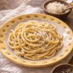Cacio E Pepe recipe served creamy with Pecorino Romano and black pepper